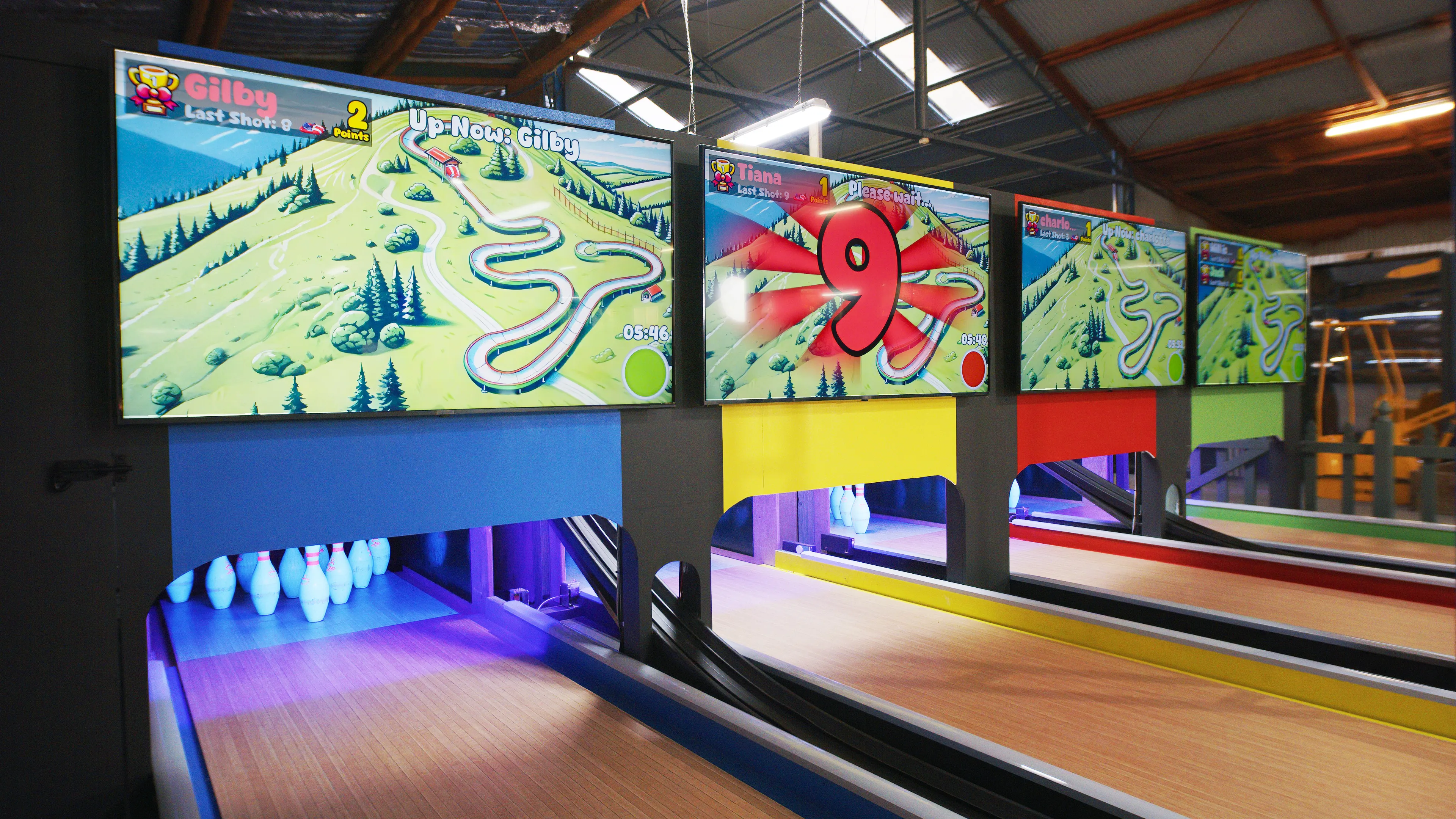 LaneCraft's proprietary scoring software displayed across multiple screens during gameplay