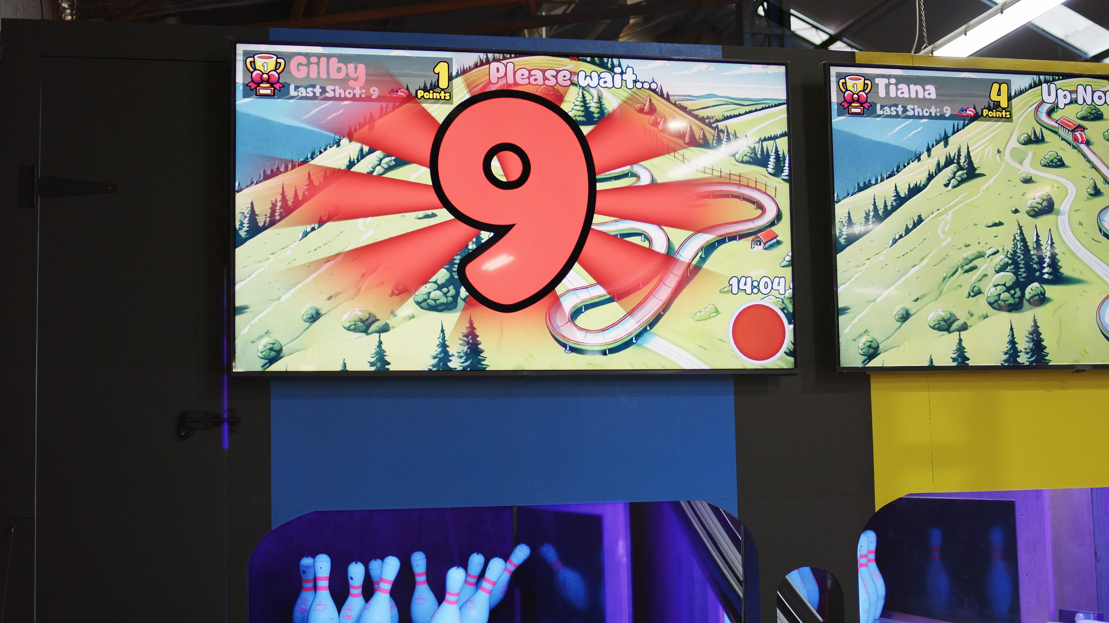 Close-up of LaneCraft's animated scoring display showing a strike result