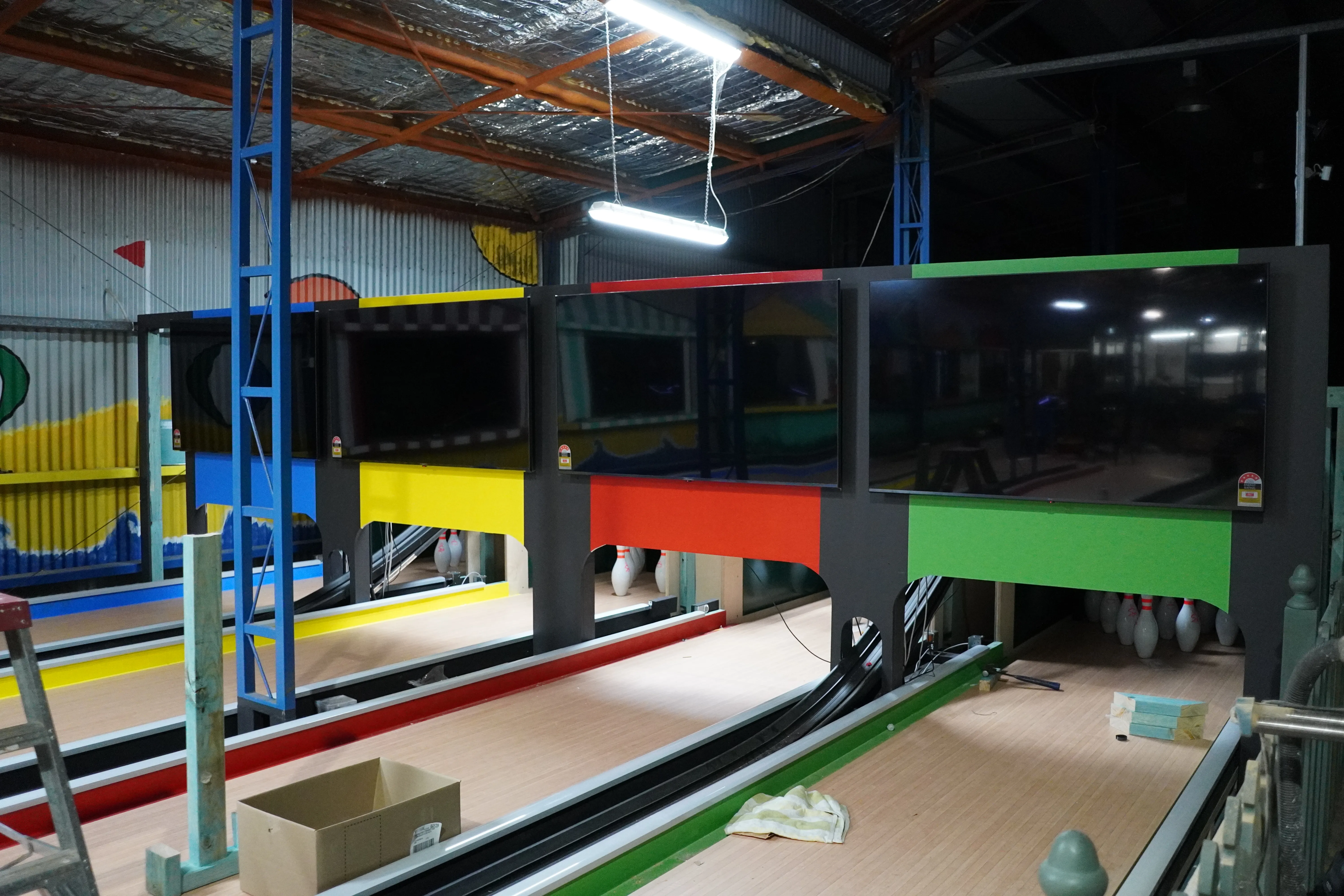 Bowling scoring screens being installed at Toboggan Hill Park